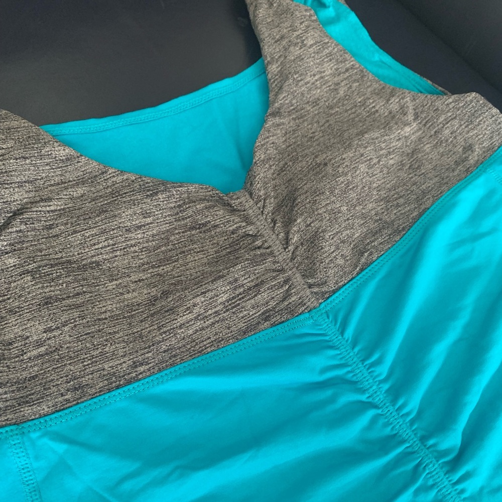 cute Lu Lu Lemon tank. bright teal blue. fits med/large